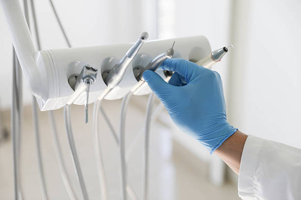 Professional Tooth Extraction technician working in Homer, MI